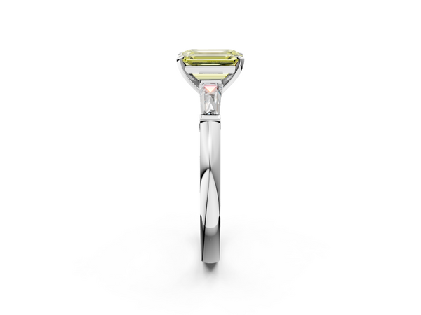 Platinum Fancy Yellow Emerald  Solitaire with Tapered Baguette Side Stones on a Classic Band with Four-Prong Setting