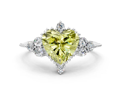 White gold Fancy Yellow Heart Cut Brilliant Diamond with Cluster Setting on a Beaded Band and Four-Prong Setting