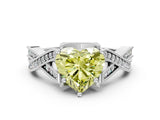 White gold Fancy Yellow Heart Cut Cut Diamond Twisted Band with Milgrain Pave Setting and Four-Prong Setting