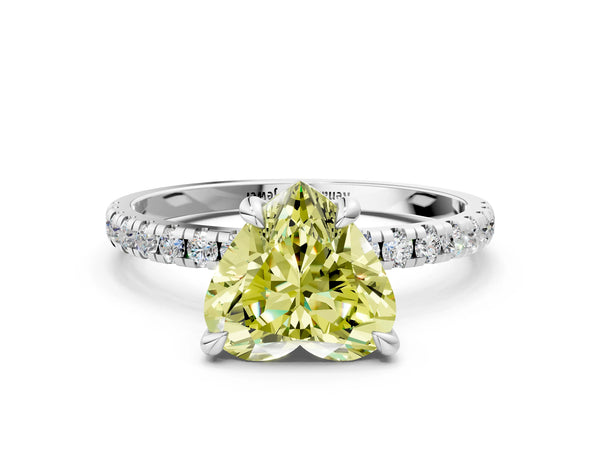 White gold Fancy Yellow Heart Cut Diamond Brilliant Solitaire Ring with Pavé Band and Four-Prong Setting