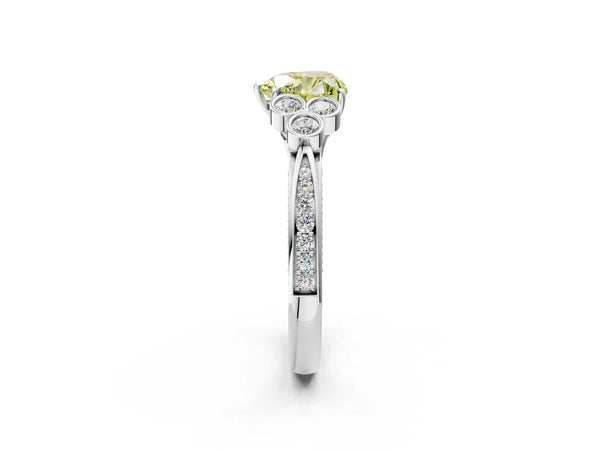 Platinum Fancy Yellow Heart  Cut Diamond Engagement Ring with Bezel Set Round Side Stones and Prong Setting