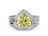 White gold Fancy Yellow Heart Cut Diamond Halo Ring with Split Shank and Bezel Accents and Prong Setting