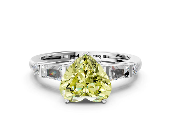 White gold Fancy Yellow Heart  Cut Diamond Ring with Baguette Side Stones, Channel Set Band, and Four-Prong Setting
