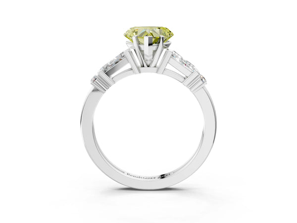 White gold Fancy Yellow Heart  Cut Diamond Ring with Baguette Side Stones, Channel Set Band, and Four-Prong Setting