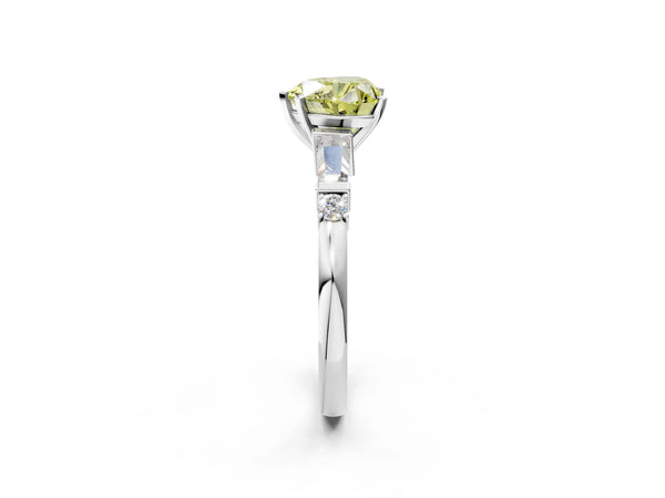 White gold Fancy Yellow Heart  Cut Diamond Ring with Baguette Side Stones, Channel Set Band, and Four-Prong Setting