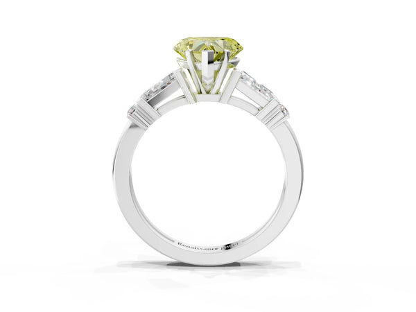 White gold Fancy Yellow Heart  Cut Diamond Ring with Baguette Side Stones, Channel Set Band, and Four-Prong Setting