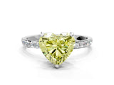 White gold Fancy Yellow Heart Cut Diamond Solitaire Ring with Round  Pavé Band and Prong Setting_147