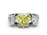 White gold Fancy Yellow Heart Cut Diamond Three-Stone Ring with Channel Set Band and Four-Prong Setting_81