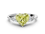 White gold Fancy Yellow Heart Cut Diamond Three-Stone Ring with Pear  Side Stones and Prong Setting_150