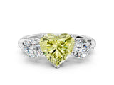 White gold Fancy Yellow Heart Cut Diamond Three-Stone Ring with Prong Setting and Pavé Band