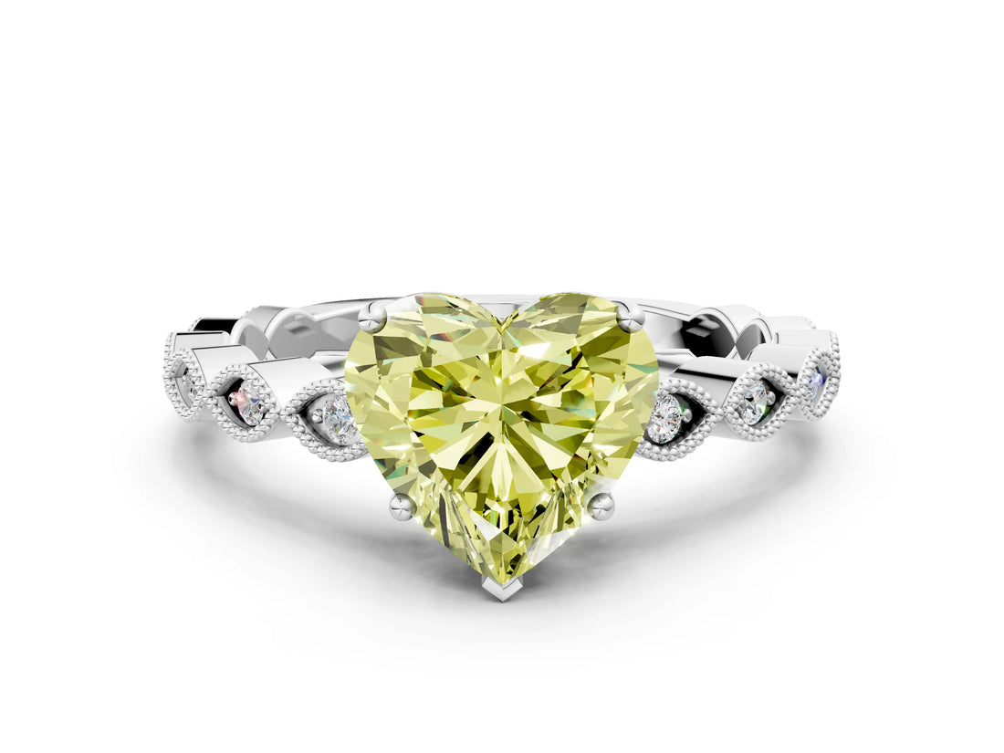 White gold Fancy Yellow Heart Cut Solitaire Diamond Ring with Infinity Twist Band and Four-Prong Setting