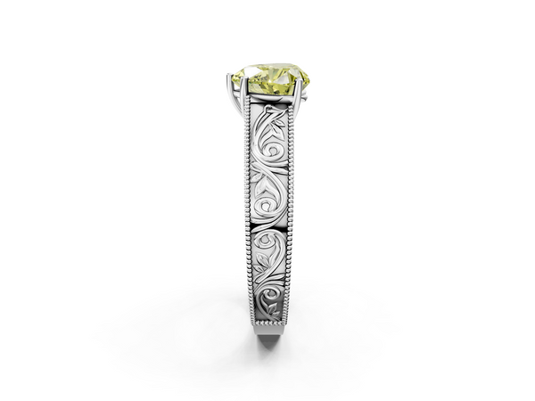 Platinum Fancy Yellow Heart Cut Diamond Solitaire Ring with Engraved Band and Four-Prong Setting