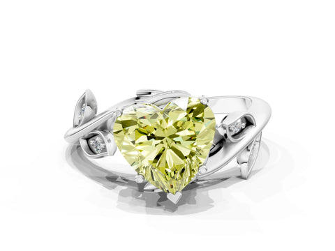 White gold Fancy Yellow Heart Cut Solitaire Twist Engagement Ring with Leaf Accents and Prong Setting