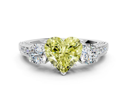 White gold Fancy Yellow Heart Cut Three-Stone Diamond Ring with Pavé Band and Four-Prong Setting