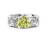 White gold Fancy Yellow Heart Cut Three-Stone Diamond Ring with Prong Setting on a Classic Band_18