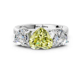 White gold Fancy Yellow Heart Cut Three-Stone Diamond Ring with Prong Setting on a Classic Band_30