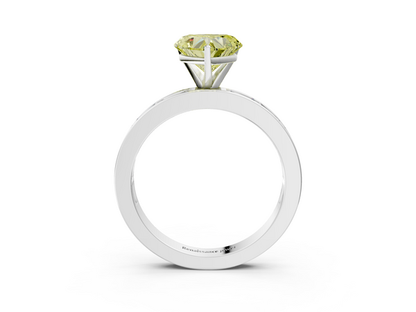 White gold Fancy Yellow Heart  Solitaire Diamond Ring with Channel-Set Baguette Band and Four-Prong Setting