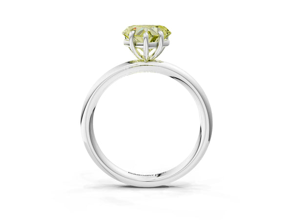 Platinum Fancy Yellow Heart  Solitaire Diamond Ring with Four-Prong Setting on a Plain Band