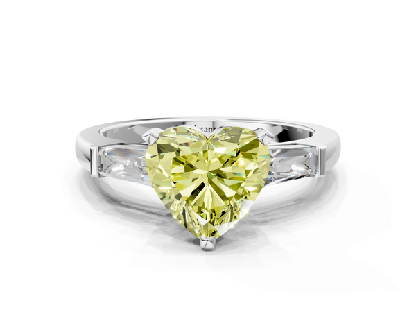 White gold Fancy Yellow Heart  Solitaire with Tapered Baguette Side Stones on a Classic Band with Four-Prong Setting
