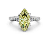 White gold Fancy Yellow Marquise Cut Brilliant Split Shank Pave Solitaire Ring with Four-Prong Setting