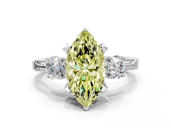 White gold Fancy Yellow Marquise Cut Brilliant Three-Stone Diamond Ring with Pavé Band and Four-Prong Setting