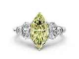 White gold Fancy Yellow Marquise  Cut Diamond Cluster Ring with Round Accent Stones and Prong Setting on a Classic Band_29