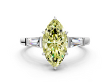 White gold Fancy Yellow Marquise  Cut Diamond Ring with Tapered Baguette Side Stones in Four-Prong Setting