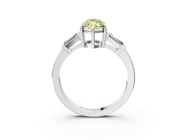 White gold Fancy Yellow Marquise  Cut Diamond Ring with Tapered Baguette Side Stones in Four-Prong Setting