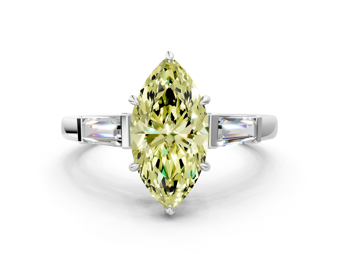 White gold Fancy Yellow Marquise  Cut Diamond Ring with Tapered Baguette Side Stones in Four-Prong Setting