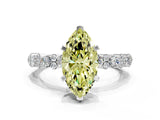 White gold Fancy Yellow Marquise Cut Diamond Side Stone Solitaire Ring with Round  and Four-Prong Setting_89