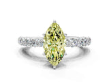 White gold Fancy Yellow Marquise Cut Diamond Solitaire Ring with Shared Prong Pavé Band and Four-Prong Setting_45