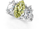 White gold Fancy Yellow Marquise Cut Diamond Three-Stone Ring with Channel Set Band and Four-Prong Setting_47