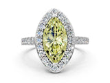 White gold Fancy Yellow Marquise Cut Halo Diamond Ring with Pavé Band and Three-Prong Setting