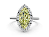 White gold Fancy Yellow Marquise Cut Halo Round Diamond Solitaire Ring with Pavé Band and Four-Prong Setting