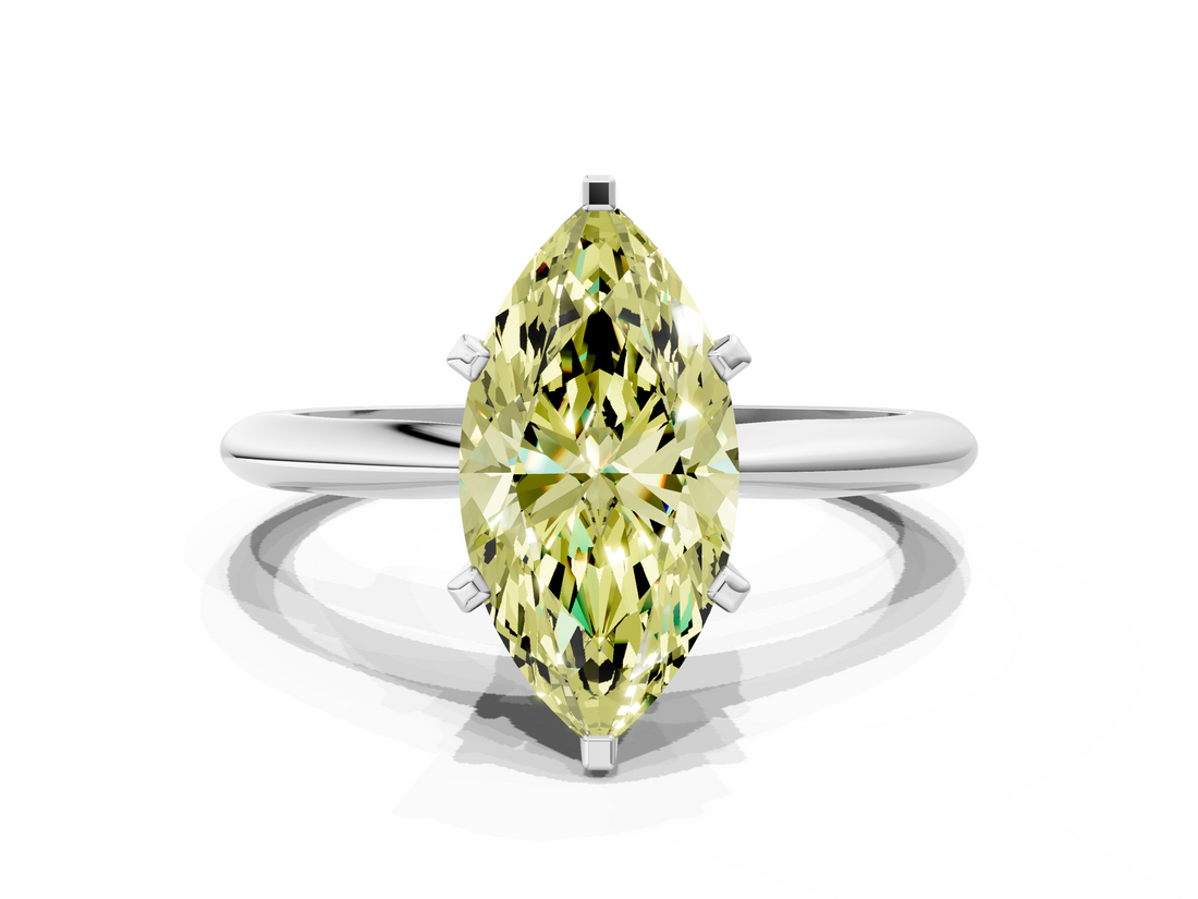 White gold Fancy Yellow Marquise  Cut Solitaire Ring with Four-Prong Setting on a Classic Band