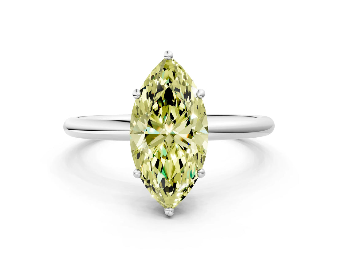 White gold Fancy Yellow Marquise  Solitaire Diamond Ring with a Classic Band and Four-Prong Setting 1