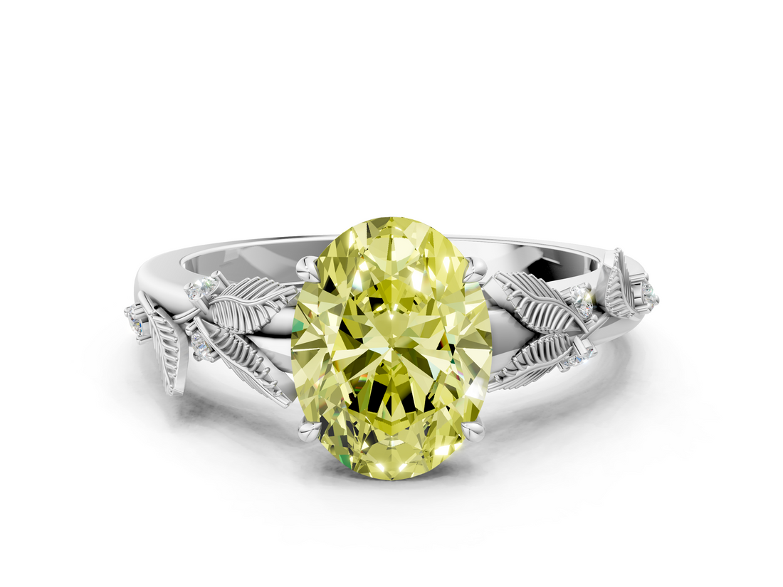 White gold Fancy Yellow Oval  Brilliant Solitaire with Leaf Motif Band and Four-Prong Setting_62