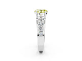 White gold Fancy Yellow Oval  Brilliant Solitaire with Side Stones on a Pave Band and Four-Prong Setting_32
