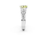White gold Fancy Yellow Oval  Brilliant Solitaire with Side Stones on a Pave Band and Four-Prong Setting_63