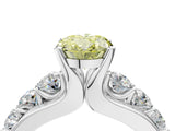 White gold Fancy Yellow Oval  Brilliant Solitaire with Side Stones on a Pave Band and Four-Prong Setting_65