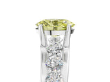 White gold Fancy Yellow Oval  Brilliant Solitaire with Side Stones on a Pave Band and Four-Prong Setting_66
