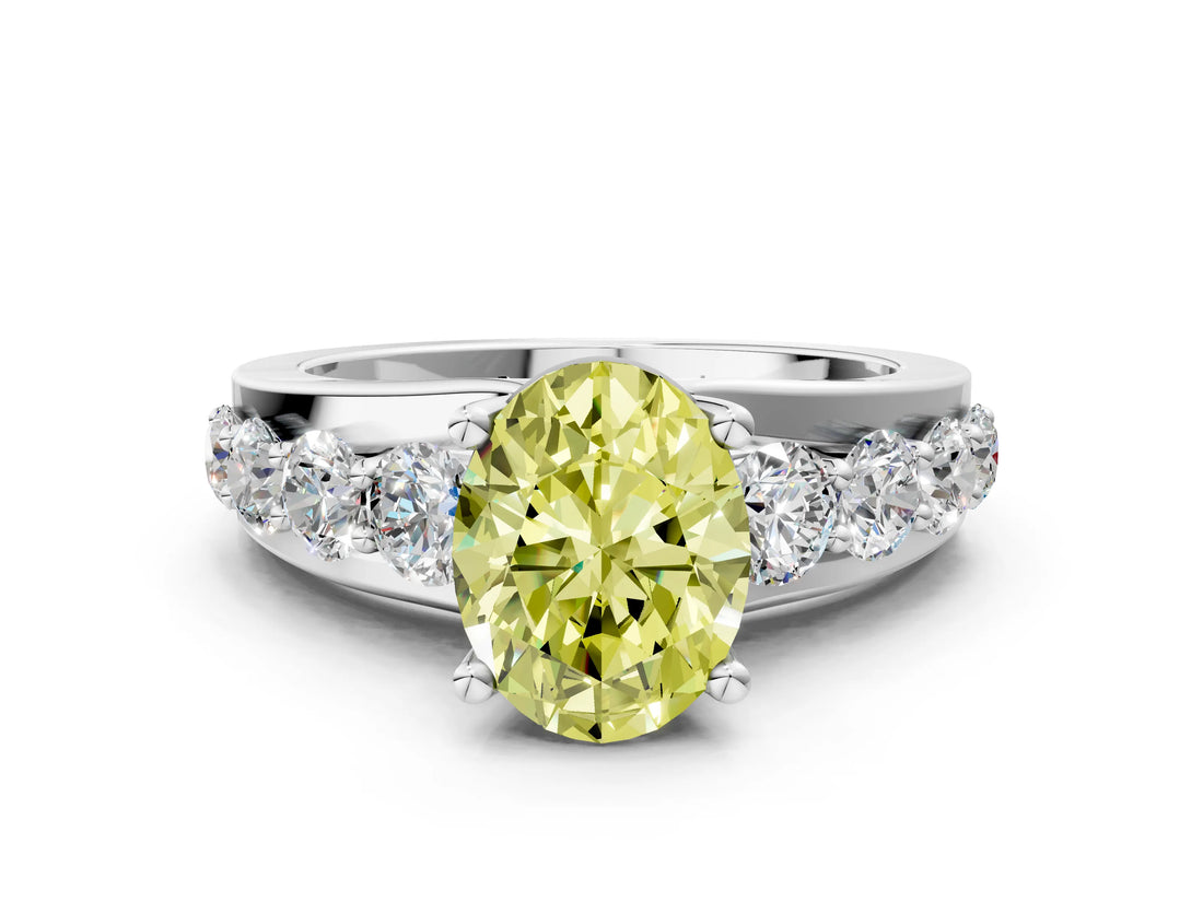 White gold Fancy Yellow Oval  Brilliant Solitaire with Side Stones on a Pave Band and Four-Prong Setting_84