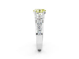 White gold Fancy Yellow Oval  Brilliant Solitaire with Side Stones on a Pave Band and Four-Prong Setting_86