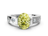 White gold Fancy Yellow Oval Cut Brilliant Channel-Set Diamond Ring with Bezel Prong Setting