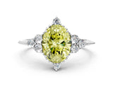 White gold Fancy Yellow Oval Cut Brilliant Diamond with Cluster Setting on a Beaded Band and Four-Prong Setting_18