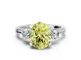 White gold Fancy Yellow Oval Cut Brilliant Three-Stone Diamond Ring with Pavé Band and Four-Prong Setting_15