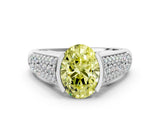 White gold Fancy Yellow Oval Cut Cut Diamond Channel Set Pave Band with Tension Prong Setting