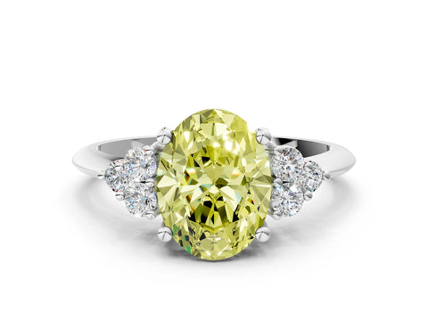 White gold Fancy Yellow Oval Cut Cut Diamond Cluster Ring with Solitaire Band and Four-Prong Setting