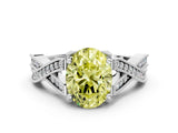 White gold Fancy Yellow Oval Cut Cut Diamond Twisted Band with Milgrain Pave Setting and Four-Prong Setting