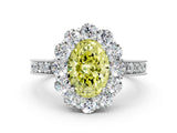 White gold Fancy Yellow Oval Cut Cut Halo Diamond Pavé Engagement Ring with Milgrain Detailing